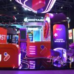 Colorful tradeshow booth with pink and purple lighting, Tony brand sign and 'Leader since 2011' display.